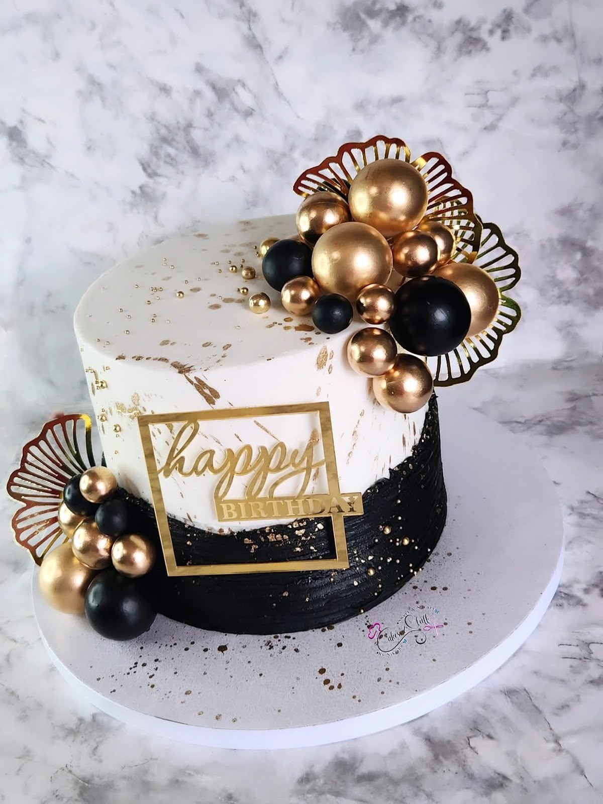 Black, White and Gold Ball Cake